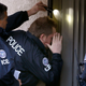 Image for article titled ICE Protests Brutal Conditions Of Being Forced To Stand Outside Homes Of Immigrants For Hours